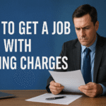 Man in a suit reading a document at desk with text: How to Get a Job with Pending Charges